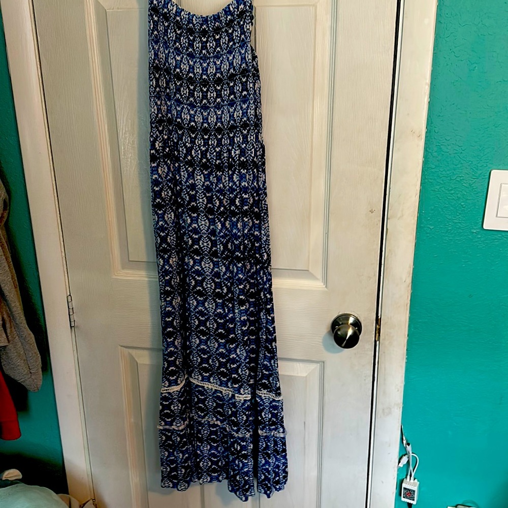 This blue black and white dress is a girls size medium